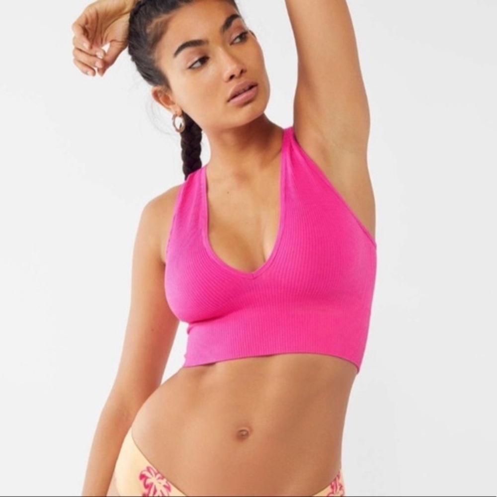 Vibrant pink out from under longline bra top